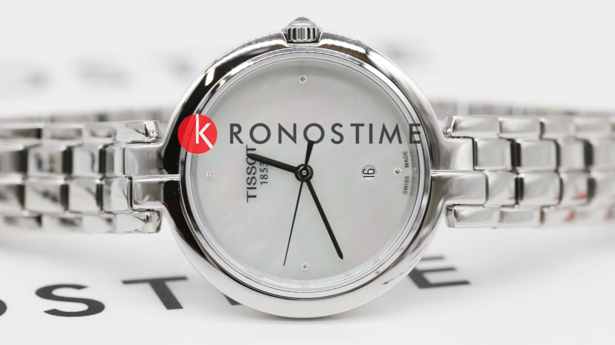 Tissot Tissot Flamingo T094.210.11.116.02 кварцевые женские часы часы крупный план перламутровый циферблата